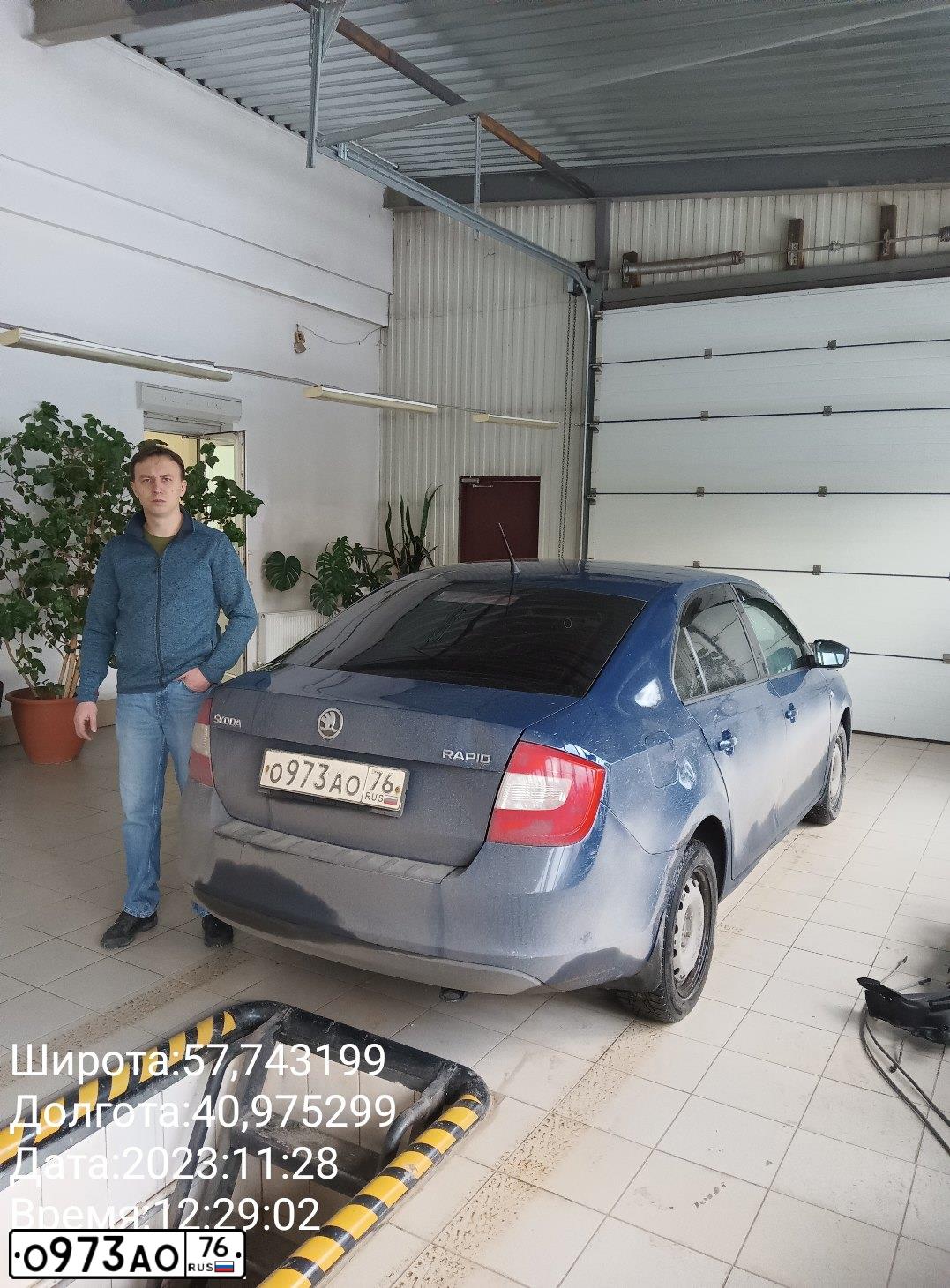 Фото автомобиля SKODA A RAPID, 2014 — госномер У034КХ44. Цвет: ТЕМНО-СИНИЙ