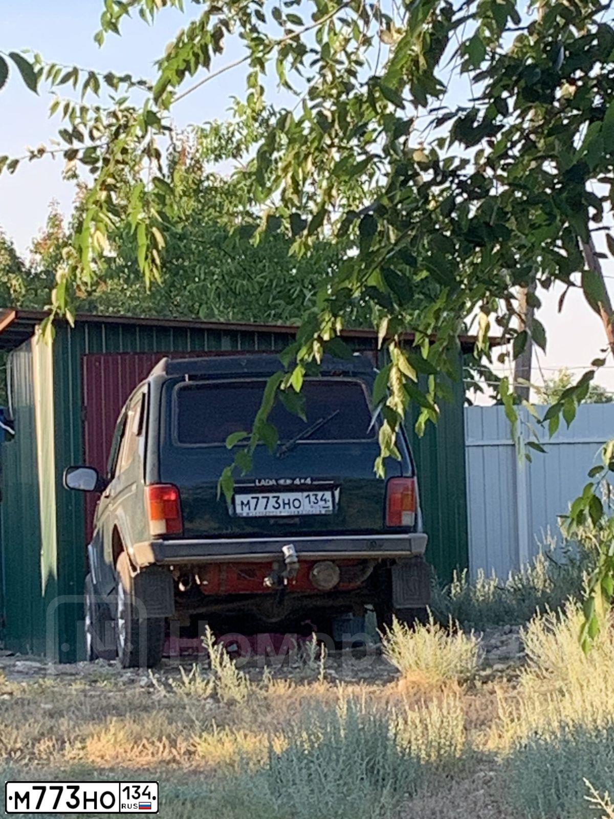Фото автомобиля LADA 2121 NIVA, 2010 — госномер Р747АМ34. Цвет: ТЕМНО ЗЕЛЕНЫЙ