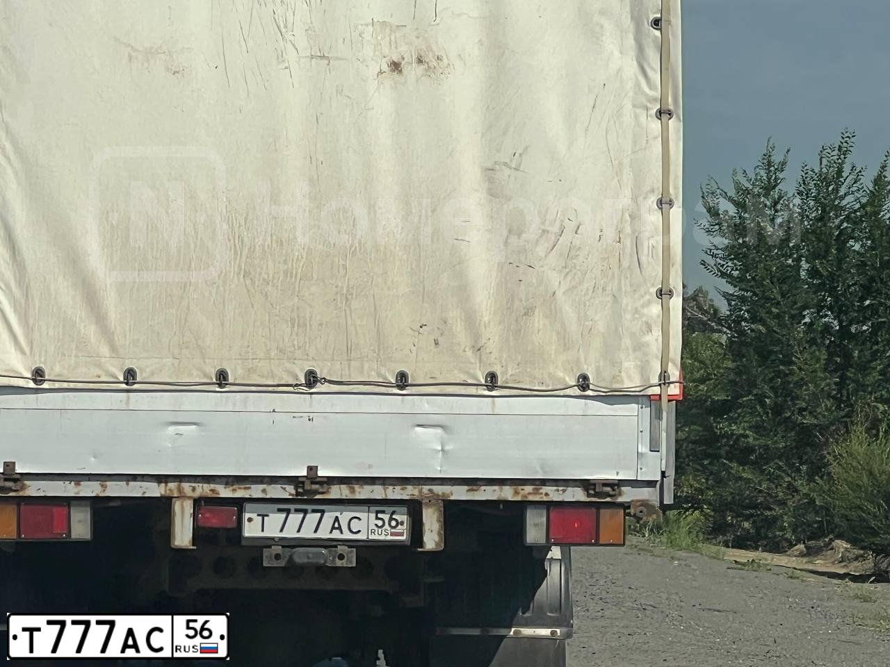 Фото автомобиля ISUZU NQR47056С, 2014 — госномер Е042ТВ156. Цвет: Белый