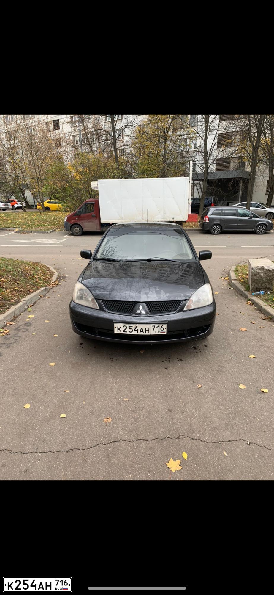 Фото автомобиля MITSUBISHI LANCER, 2004 — госномер К254АН716. Цвет: СЕРЫЙ