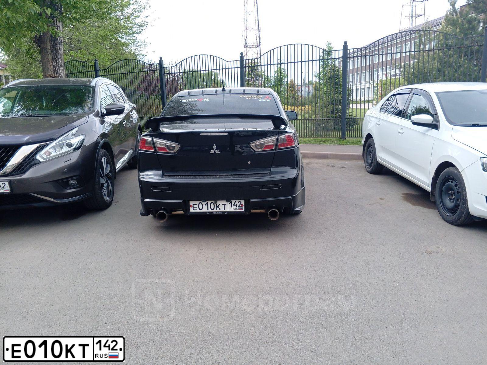 Фото автомобиля MITSUBISHI LANCER, 2007 — госномер С676ТА70. Цвет: ЧЕРНЫЙ
