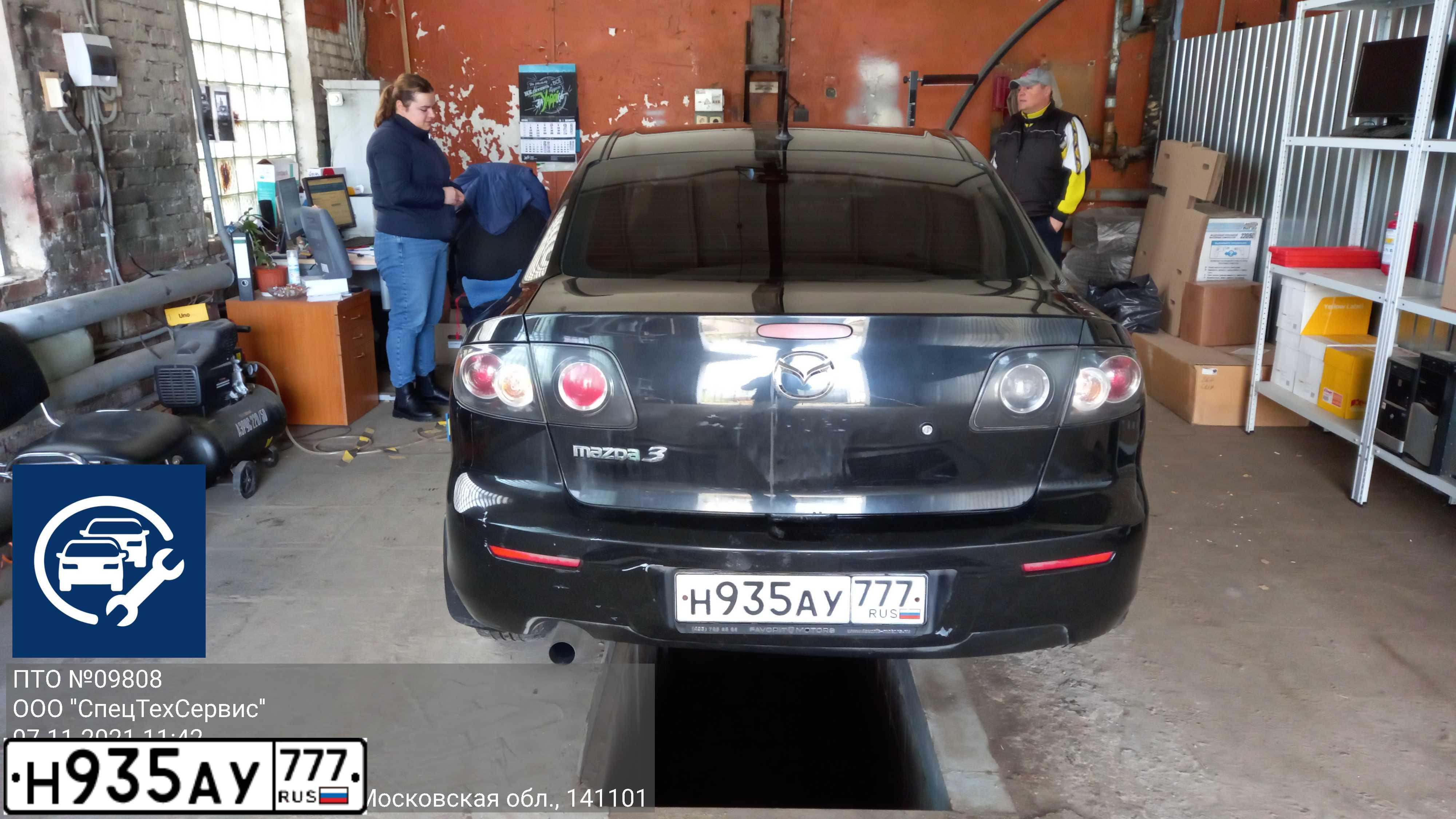 Фото автомобиля MAZDA A 3, 2008 — госномер М138ОХ150. Цвет: ЧЕРНЫЙ