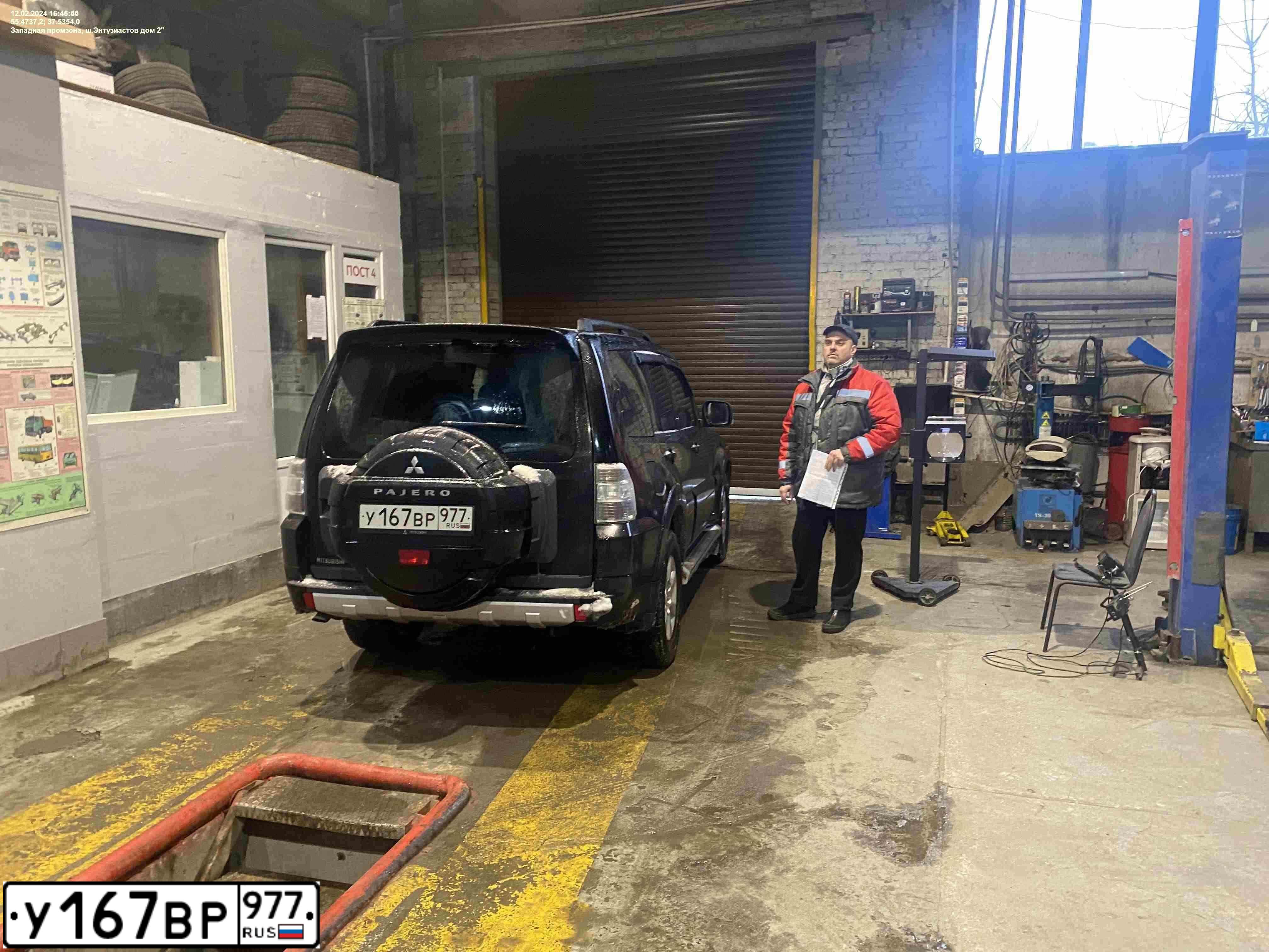 Фото автомобиля MITSUBISHI PAJERO, 2012 — госномер Н700УК77. Цвет: ЧЕРНЫЙ