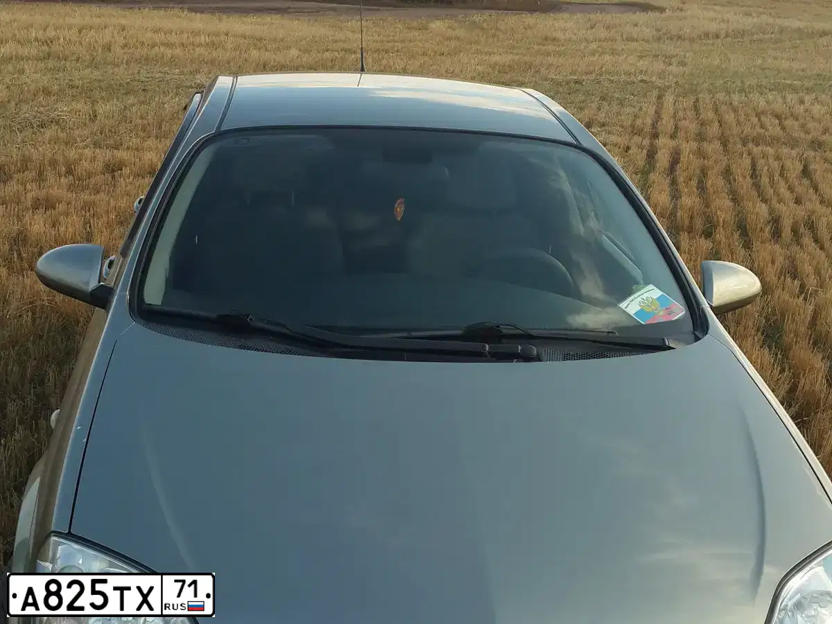 Фото автомобиля NISSAN PRIMERA, 2004 — госномер А825ТХ71. Цвет: ЗЕЛЕНЫЙ