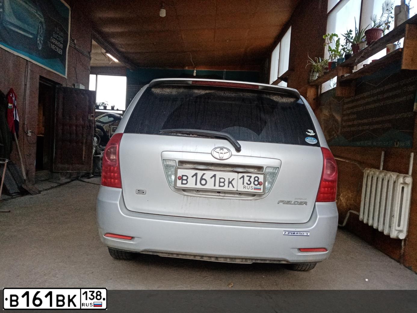 Фото автомобиля MITSUBISHI PAJERO, 2006 — госномер Е262КН138. Цвет: ЗЕЛЕНЫЙ
