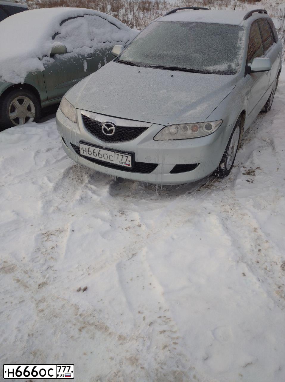 Фото автомобиля MAZDA 6, 2005 — госномер Е112КР977. Цвет: Серый