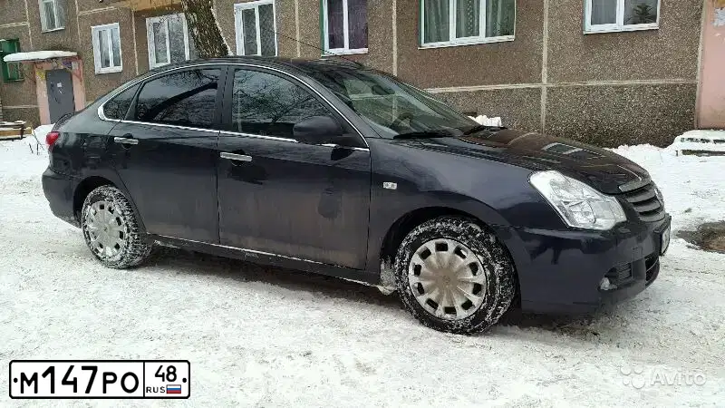 Фото автомобиля NISSAN ALMERA /AVTOVAZ/, 2013 — госномер Т444ЕВ31. Цвет: ЧЕРНЫЙ