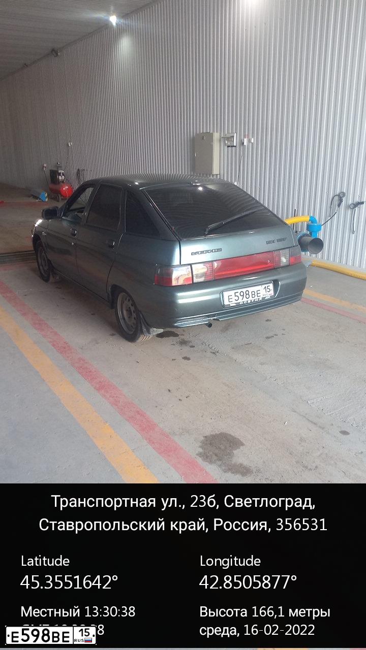 Фото автомобиля LADA 2112, 2006 — госномер Е598ВЕ15. Цвет: СЕРО-СИНЕ ЗЕЛЕНЫЙ
