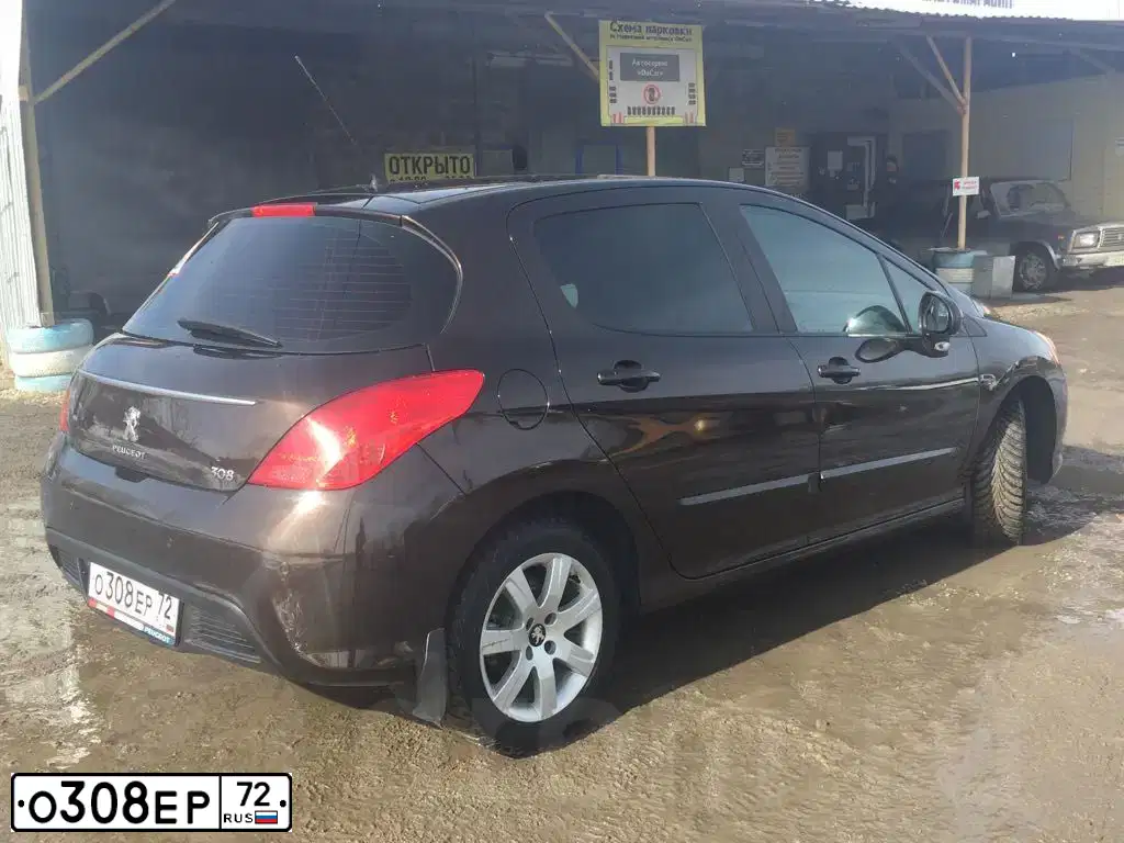 Фото автомобиля PEUGEOT 308, 2011 — госномер О308ЕР72. Цвет: Коричневый