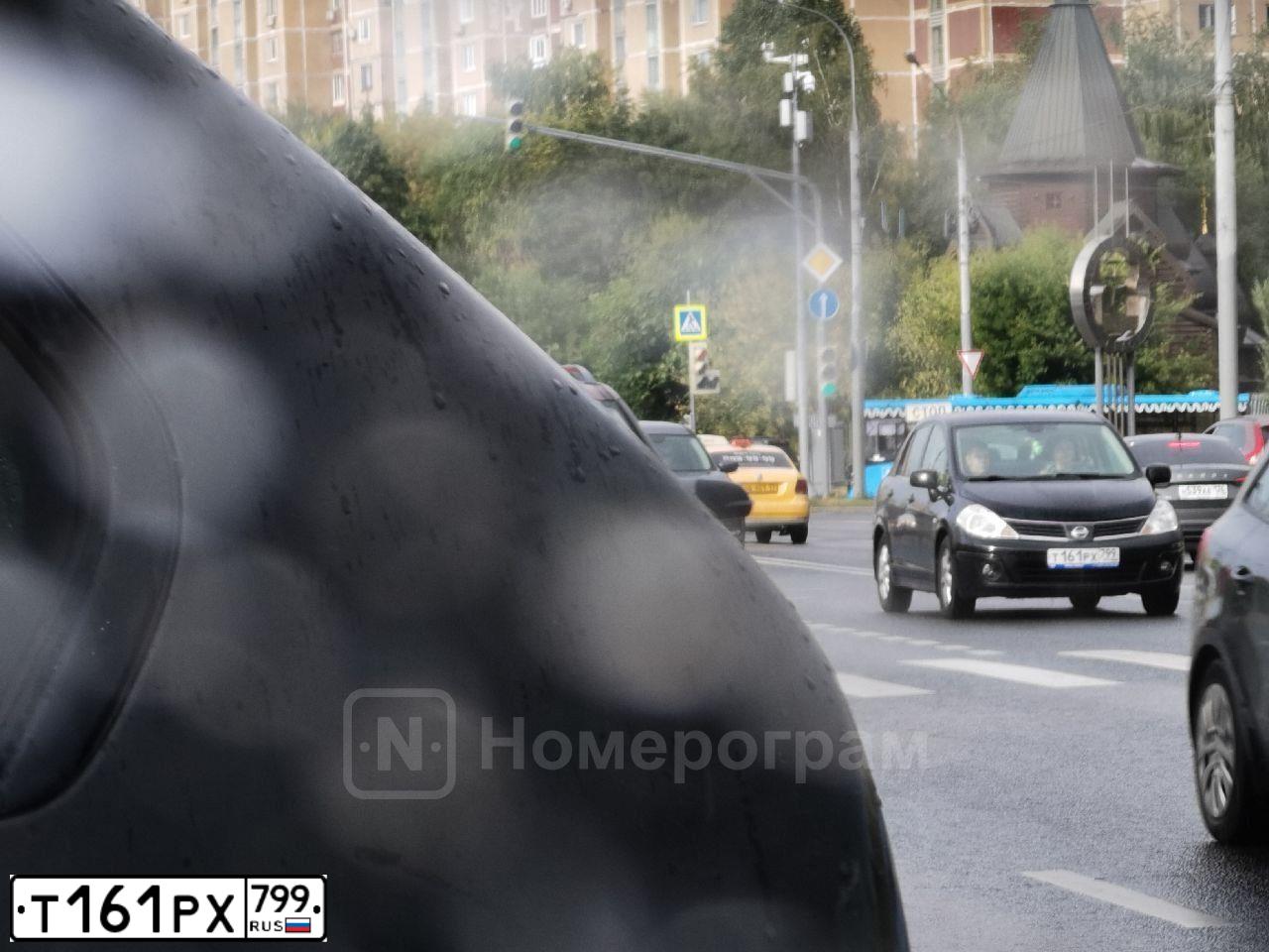 Фото автомобиля NISSAN TIIDA, 2008 — госномер Т161РХ799. Цвет: ЧЕРНЫЙ