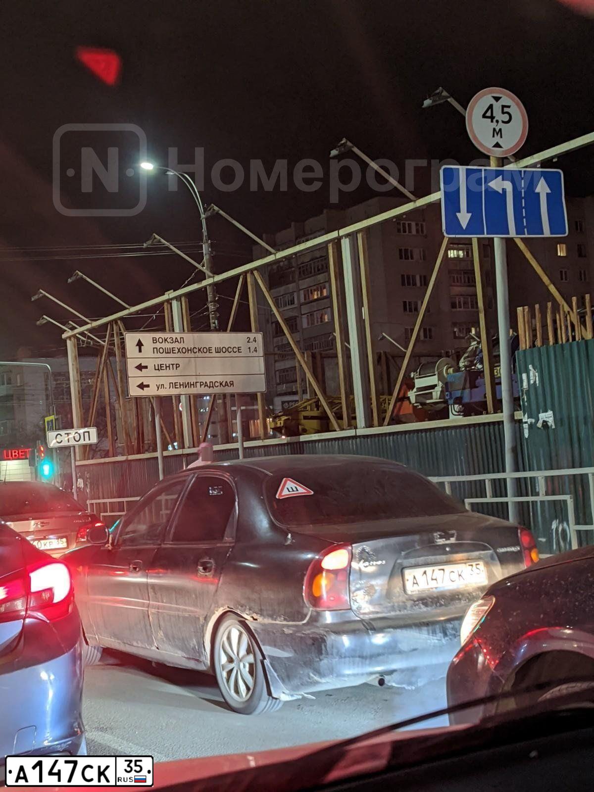 Фото автомобиля CHEVROLET LANOS, 2008 — госномер М457ОХ35. Цвет: ЧЕРНЫЙ