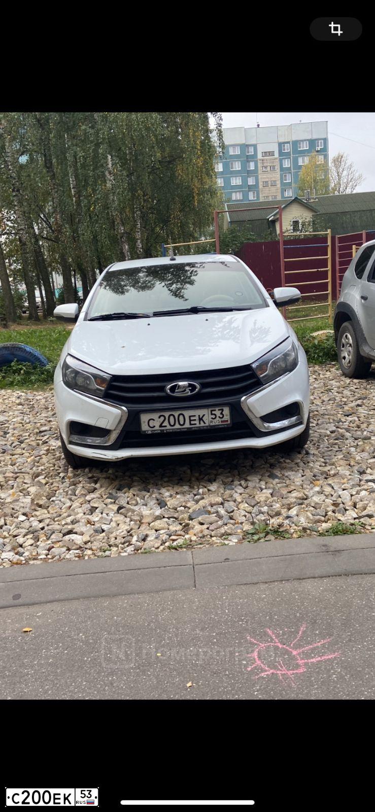 Фото автомобиля LADA VESTA, 2016 — госномер М887АК53. Цвет: Белый