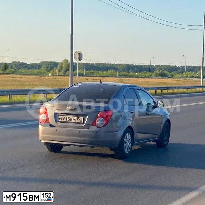Фото автомобиля CHEVROLET AVEO, 2012 — госномер М915ВМ152. Цвет: СЕРЫЙ