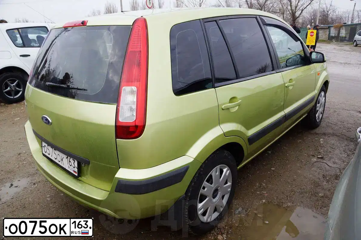 Фото автомобиля NISSAN TIIDA, 2007 — госномер О075ОК163. Цвет: ЧЕРНЫЙ