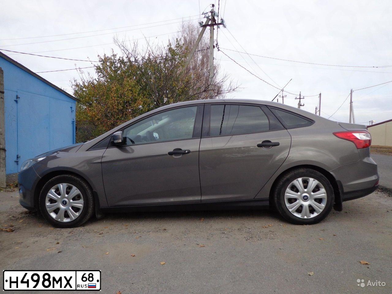 Фото автомобиля FORD FOCUS, 2013 — госномер Н335АУ136. Цвет: СЕРО-КОРИЧНЕВЫЙ