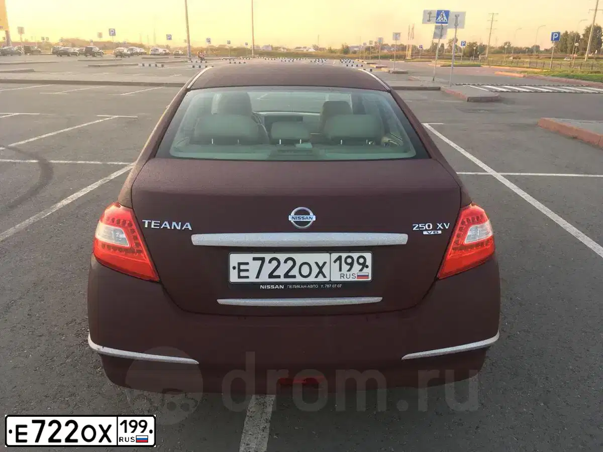 Фото автомобиля NISSAN TEANA, 2008 — госномер Е069ОК124. Цвет: ТЕМНО-БОРДОВЫЙ