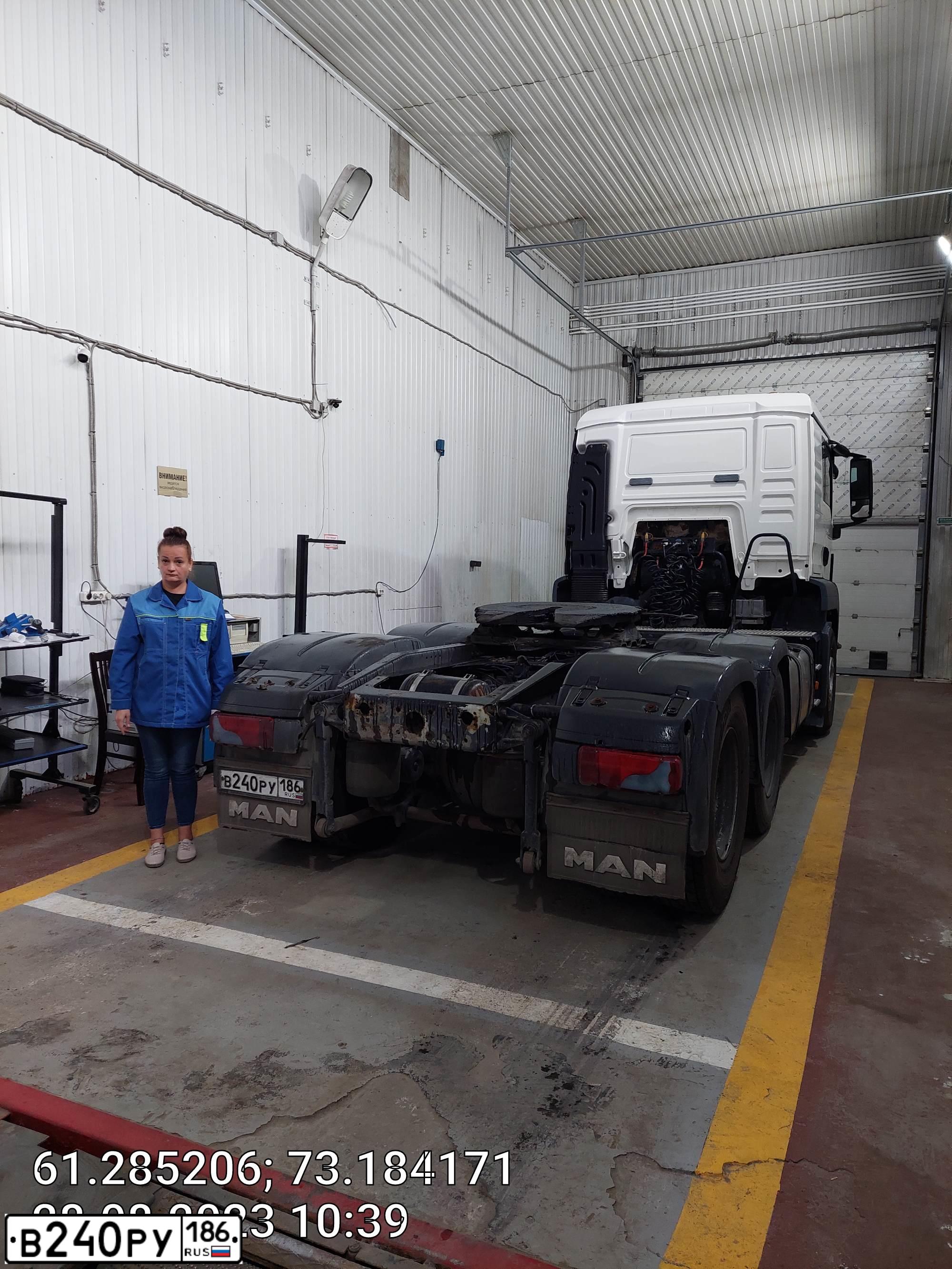 Фото автомобиля MAN TGS 26/33.XXX /6X4/, 2013 — госномер В240РУ186. Цвет: Белый