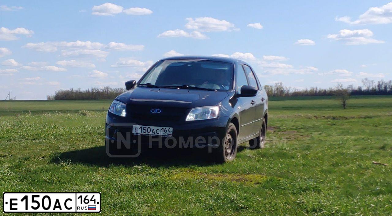 Фото автомобиля LADA 2190 GRANTA, 2018 — госномер Е150АС164. Цвет: ЧЕРНЫЙ