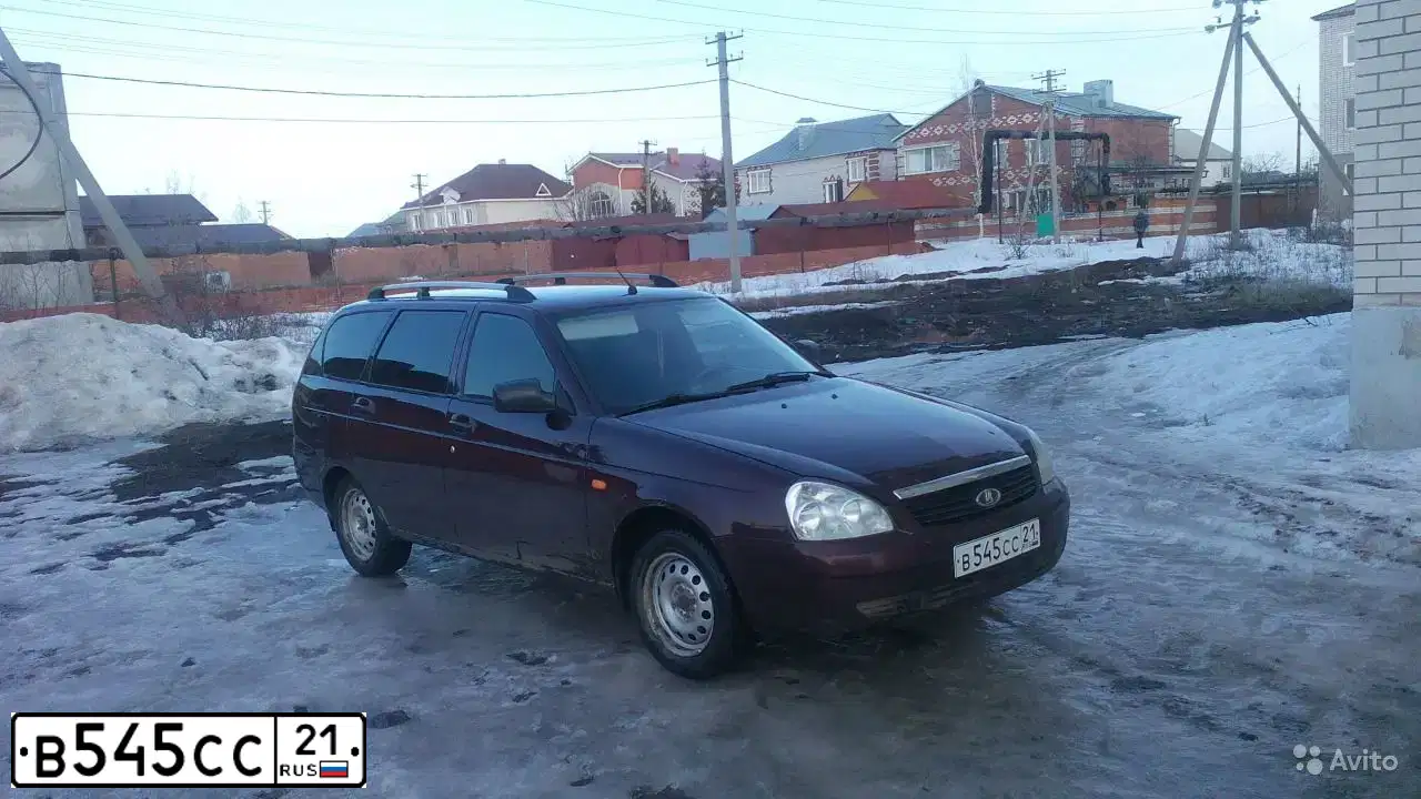 Фото автомобиля LADA 2171 PRIORA, 2010 — госномер О011ОО21. Цвет: ТЕМНО-ВИШНЕВЫЙ