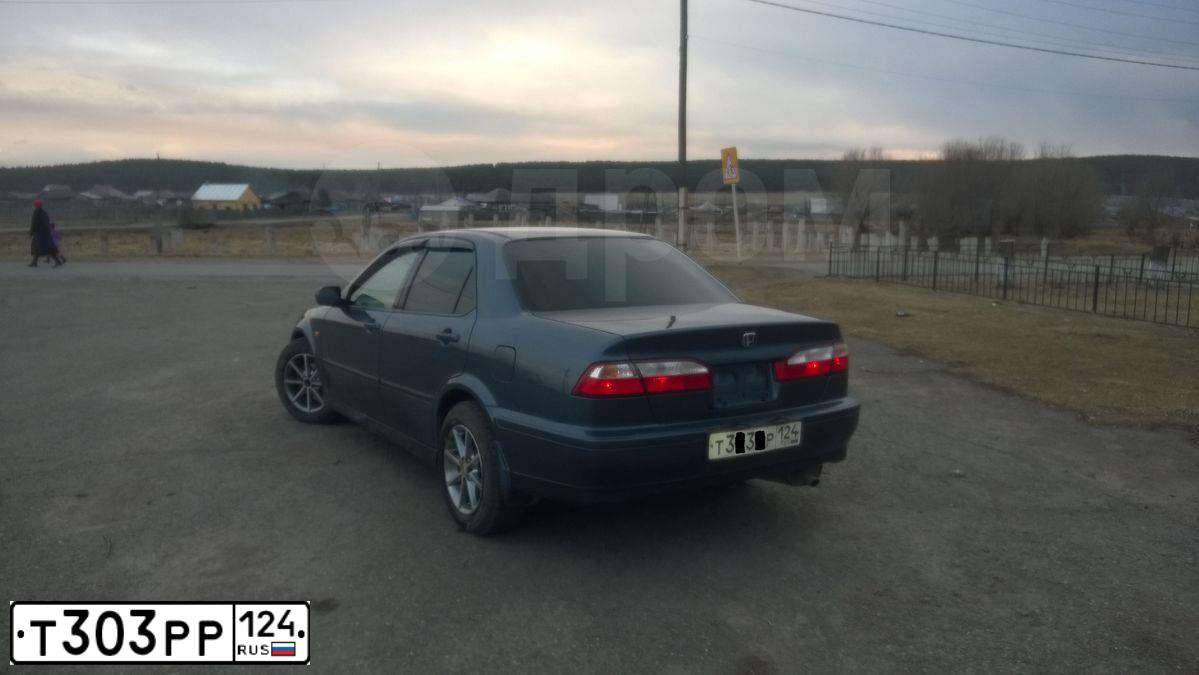 Фото автомобиля LADA 2114 SAMARA, 2012 — госномер Т303РР124. Цвет: ТЕМНО-ВИШНЕВЫЙ
