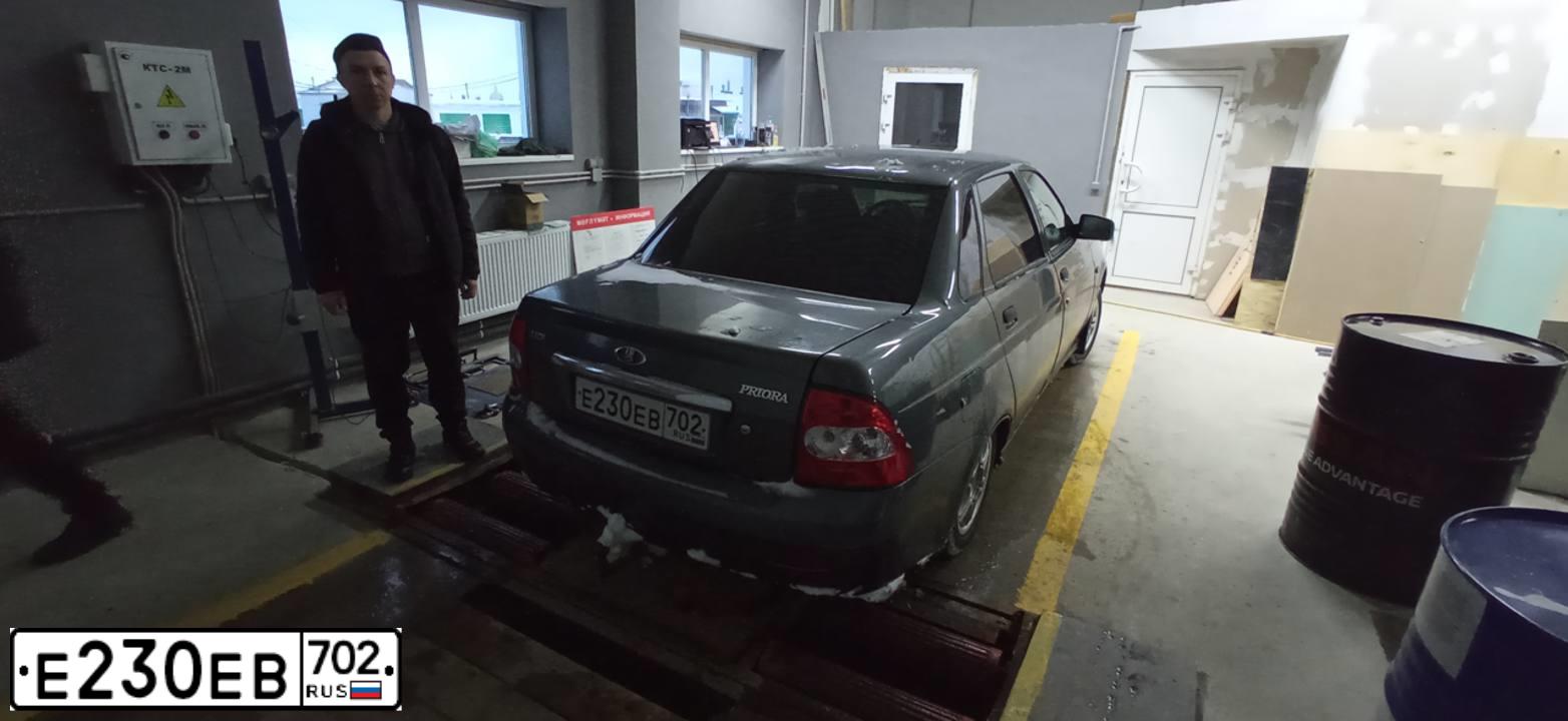 Фото автомобиля LADA 2170 PRIORA, 2009 — госномер Е230ЕВ702. Цвет: Серо-сине-зеленый