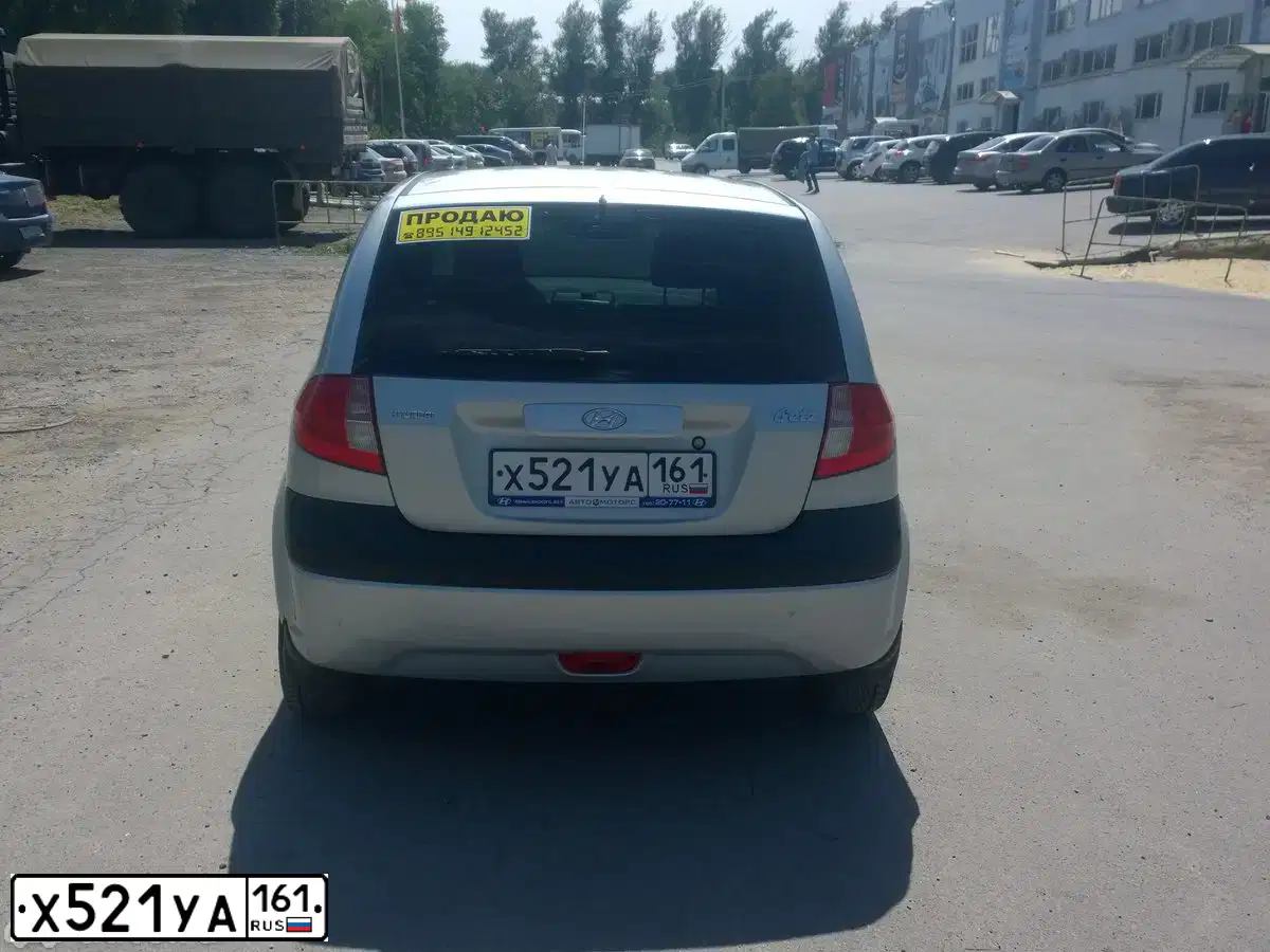 Фото автомобиля HYUNDAI GETZ, 2008 — госномер Х521УА161. Цвет: Серебристый