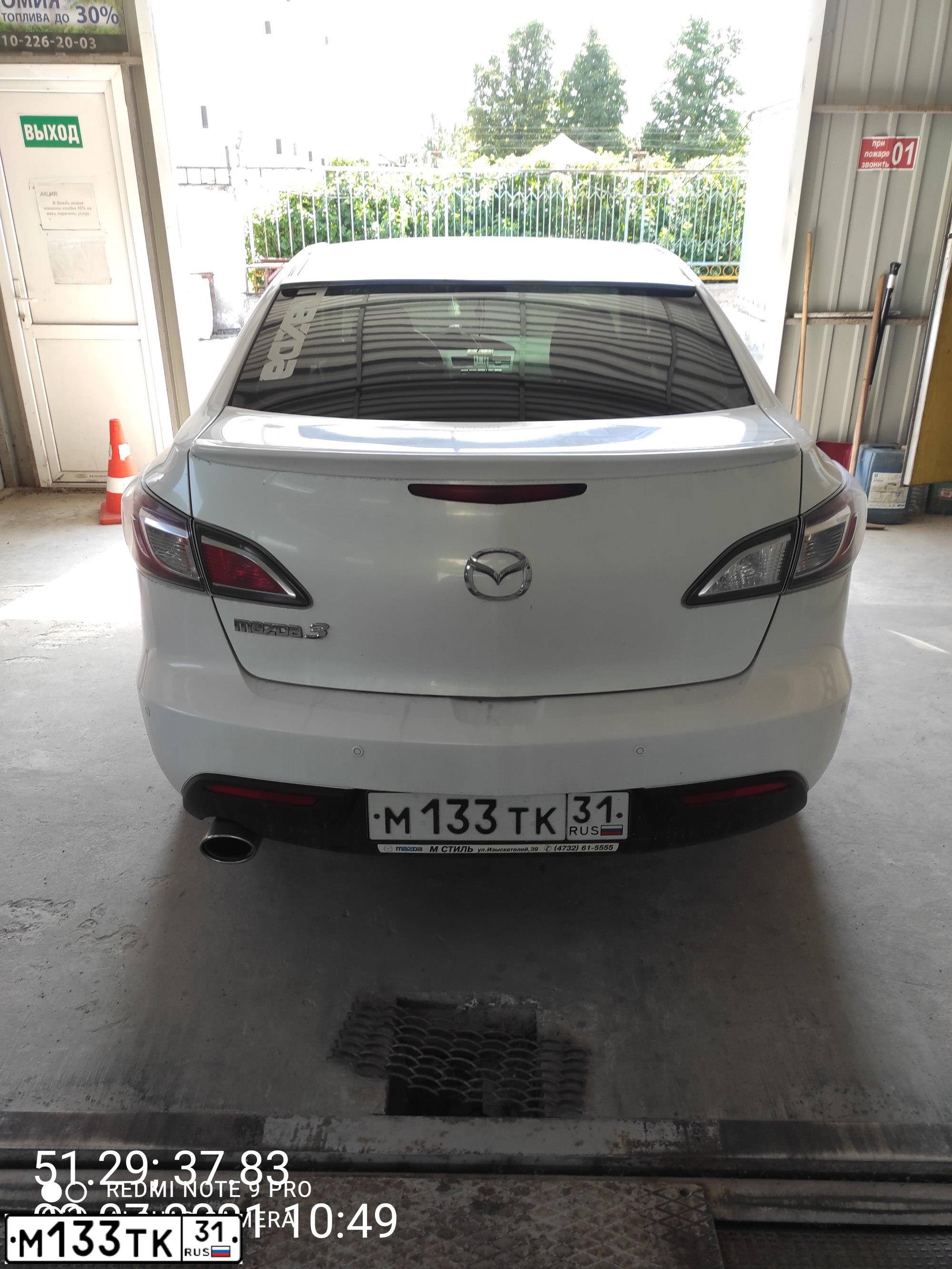 Фото автомобиля MAZDA 3, 2010 — госномер М133ТК31. Цвет: Белый