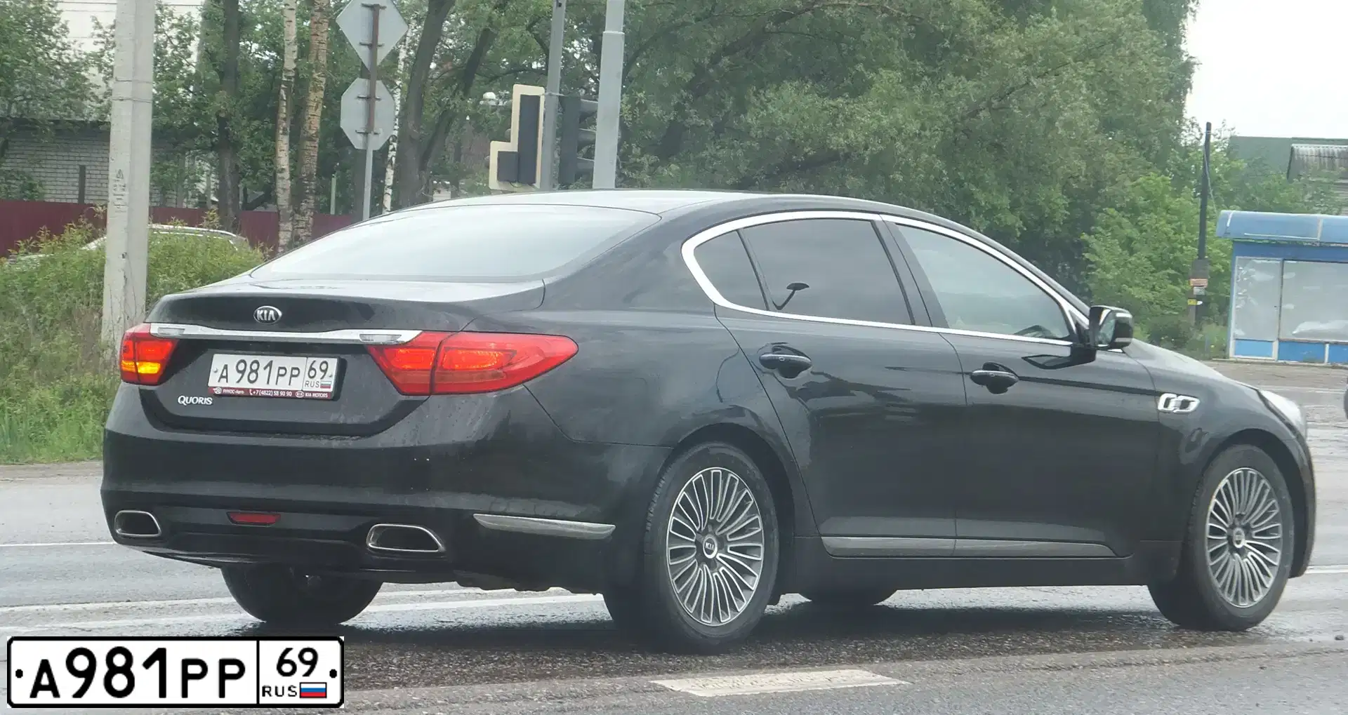 Фото автомобиля KIA QUORIS, 2013 — госномер А981РР69. Цвет: ЧЕРНЫЙ