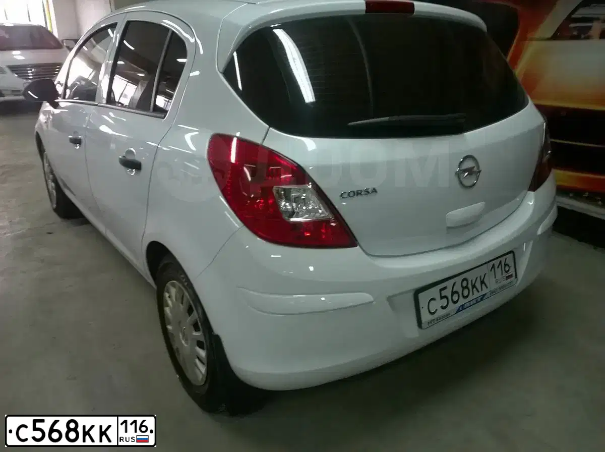 Фото автомобиля OPEL CORSA, 2012 — госномер С568КК116. Цвет: БЕЛЫЙ
