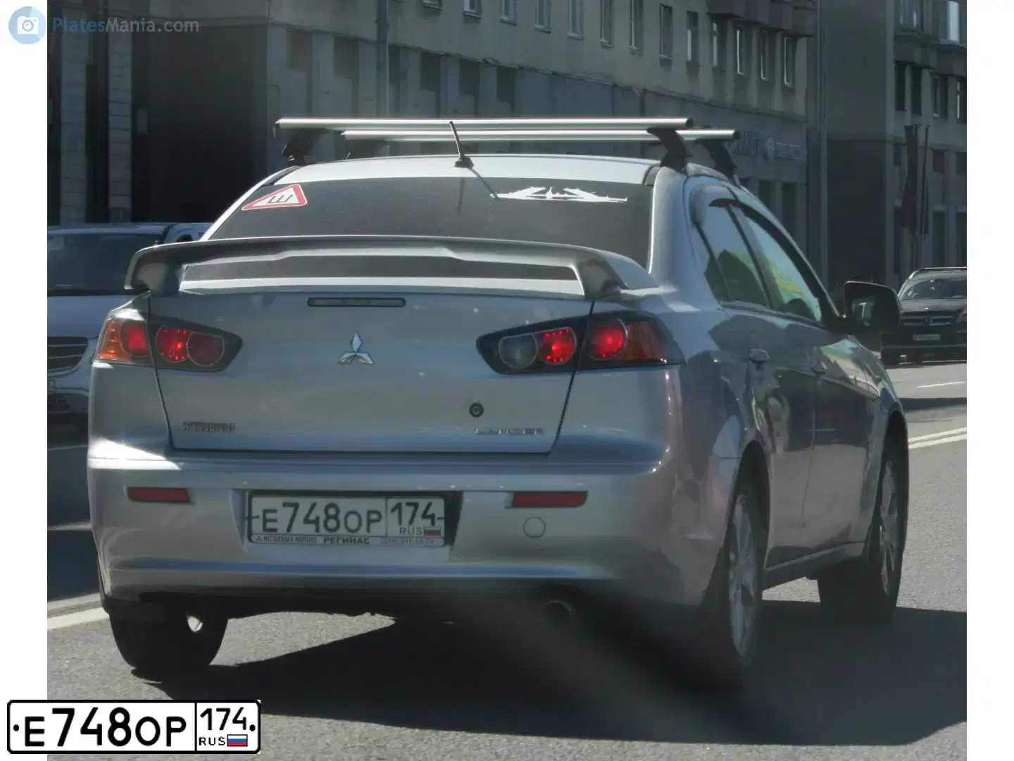 Фото автомобиля MITSUBISHI LANCER, 2011 — госномер Е748ОР174. Цвет: СЕРЕБРИСТЫЙ