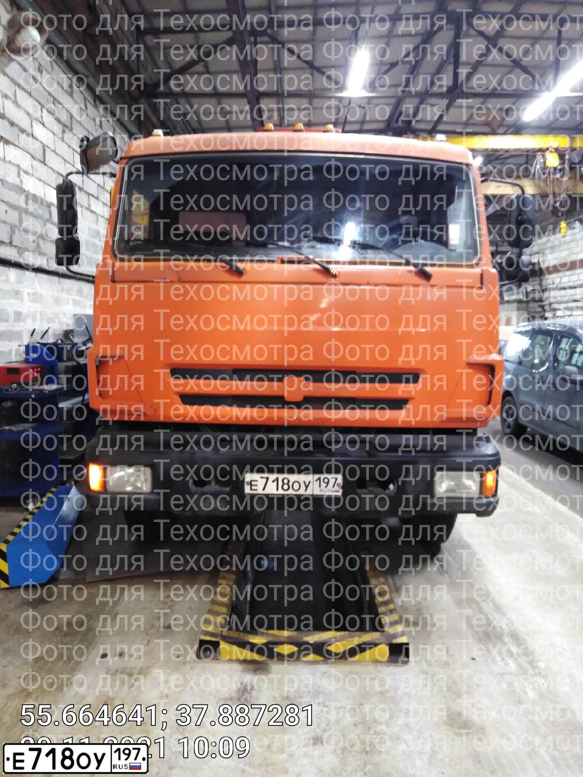 Фото автомобиля KAMAZ 65115 /6X4/, 2011 — госномер Е718ОУ197. Цвет: ОРАНЖЕВЫЙ