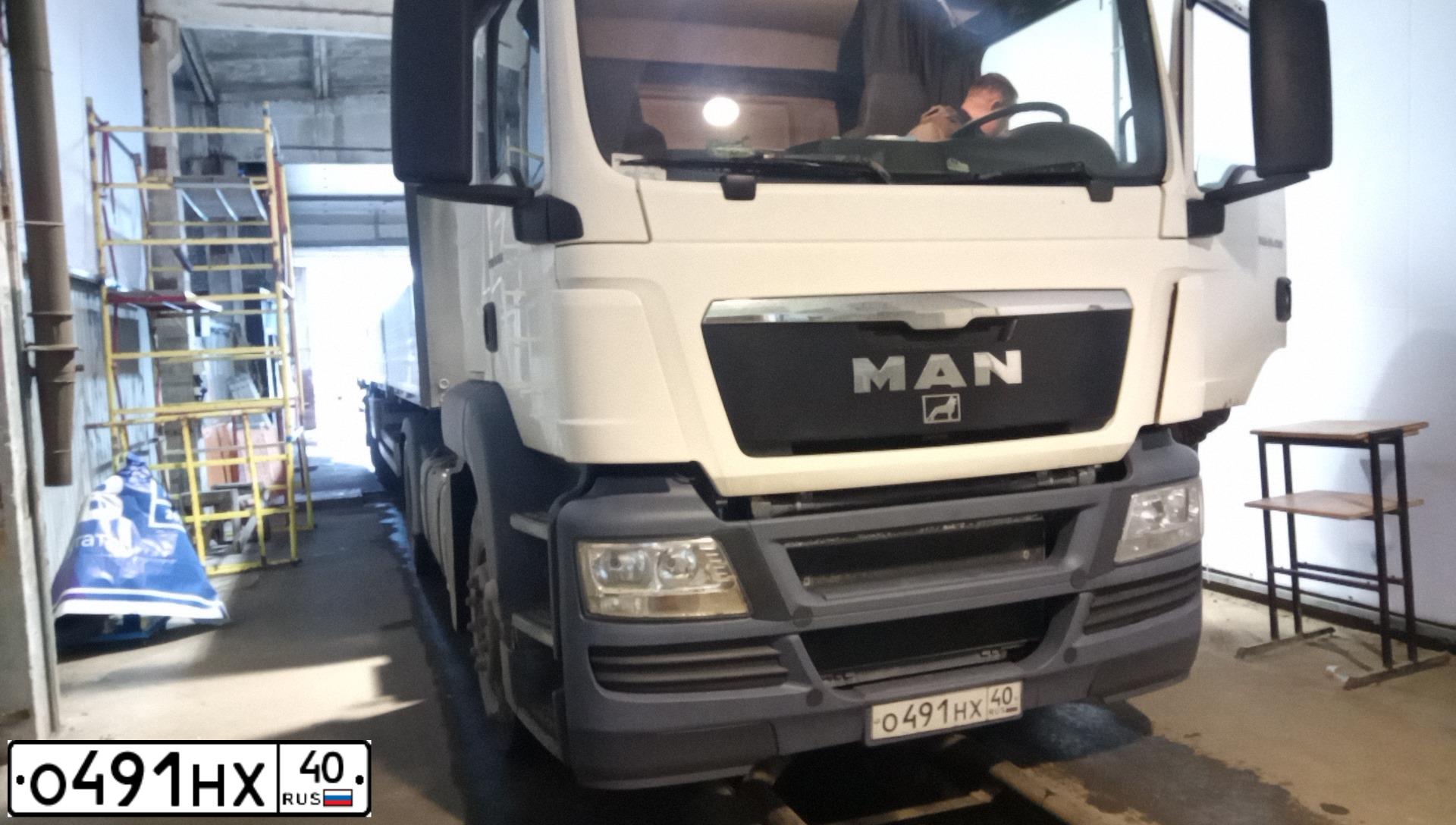 Фото автомобиля MAN TGS 19.XXX /4X2/, 2011 — госномер М067НН161. Цвет: Белый