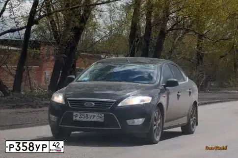 Фото автомобиля FORD MONDEO, 2010 — госномер А130ТО155. Цвет: ЧЕРНЫЙ