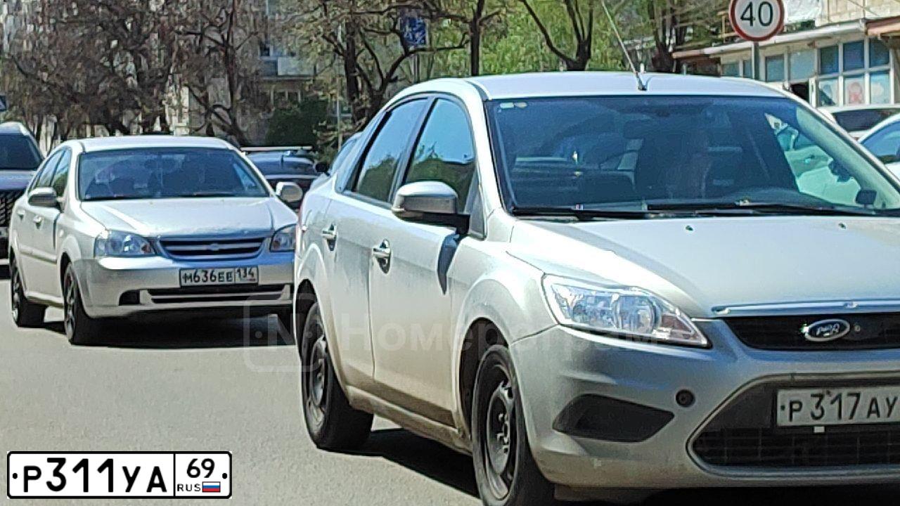 Фото автомобиля FORD FOCUS, 2014 — госномер Р311УА69. Цвет: ЧЕРНЫЙ