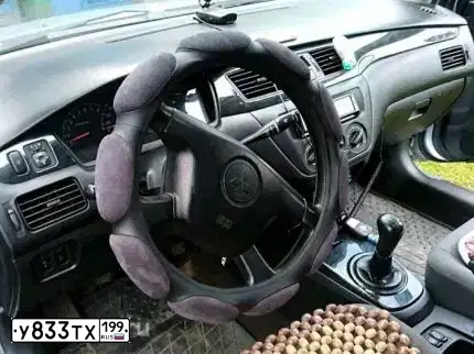 Фото автомобиля MITSUBISHI LANCER, 2003 — госномер Н277ХЕ46. Цвет: СЕРЫЙ