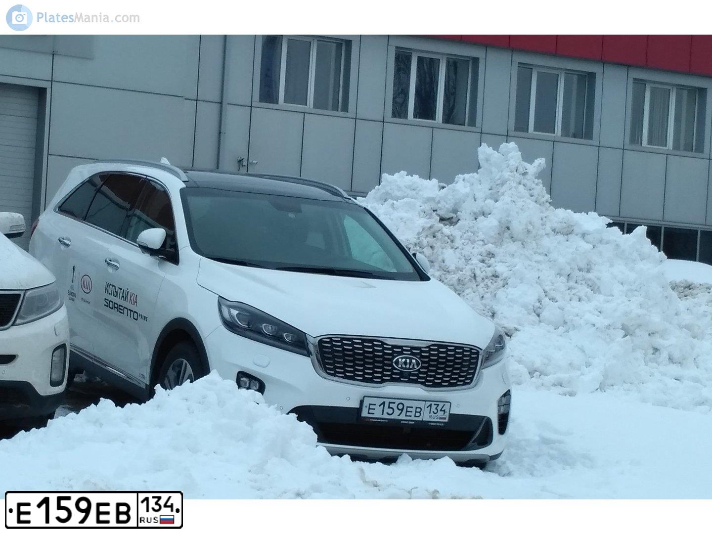 Фото автомобиля KIA SORENTO, 2017 — госномер Е159ЕВ134. Цвет: БЕЛЫЙ