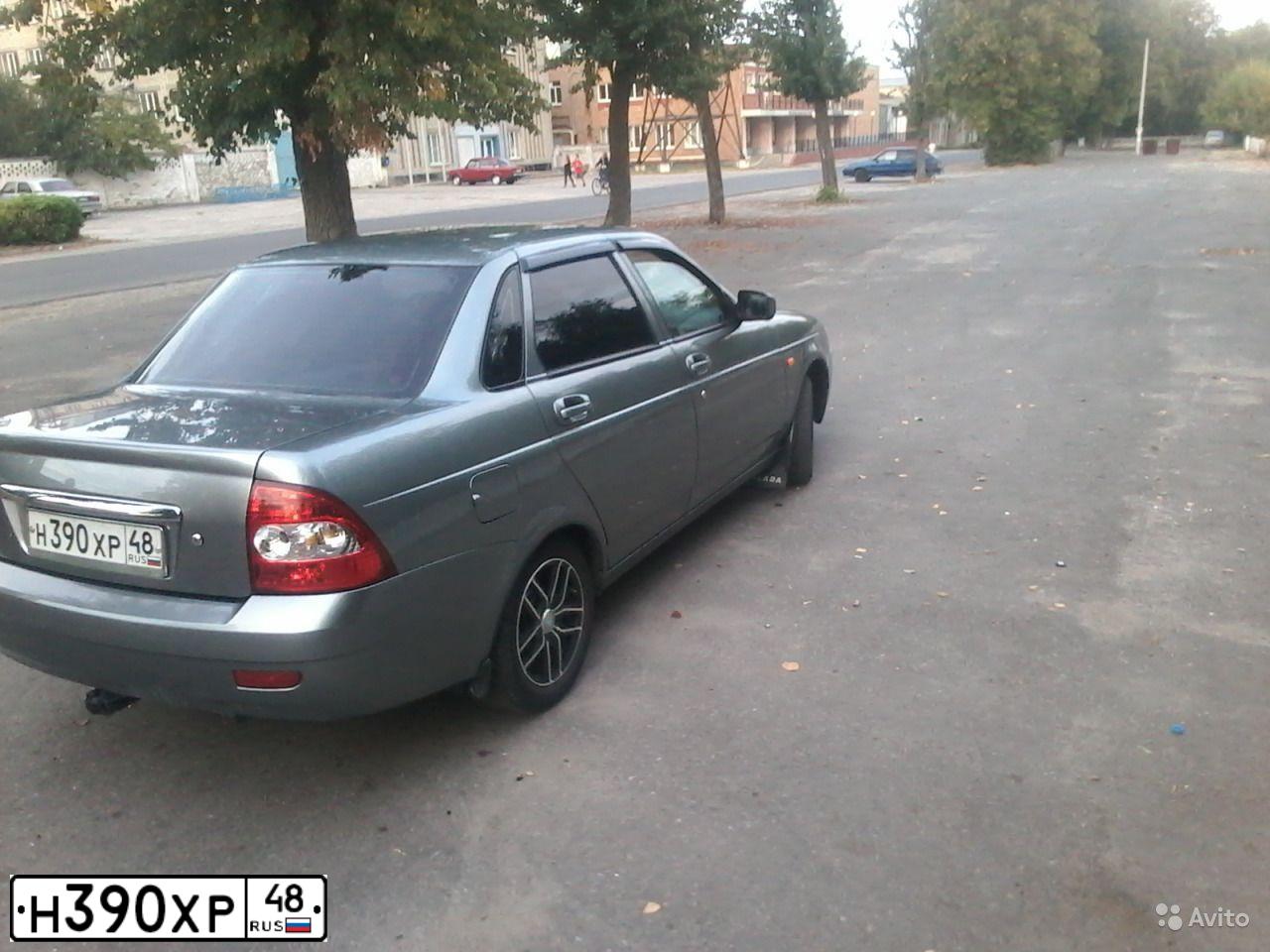 Фото автомобиля ЛАДА 217030 ЛАДА ПРИОРА, 2009 — госномер Р310ОР46. Цвет: средний серо-зеленый металлик