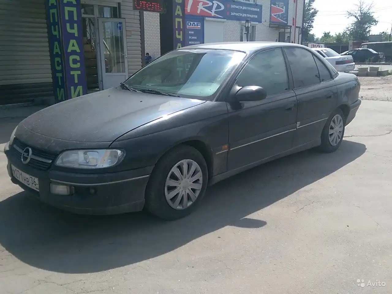 Фото автомобиля LADA 2106, 1996 — госномер К271НВ36. Цвет: Красный