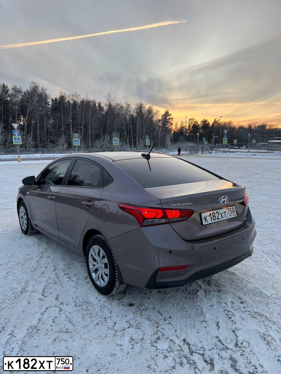 Фото автомобиля HYUNDAI SOLARIS, 2019 — госномер К182ХТ750. Цвет: Коричневый