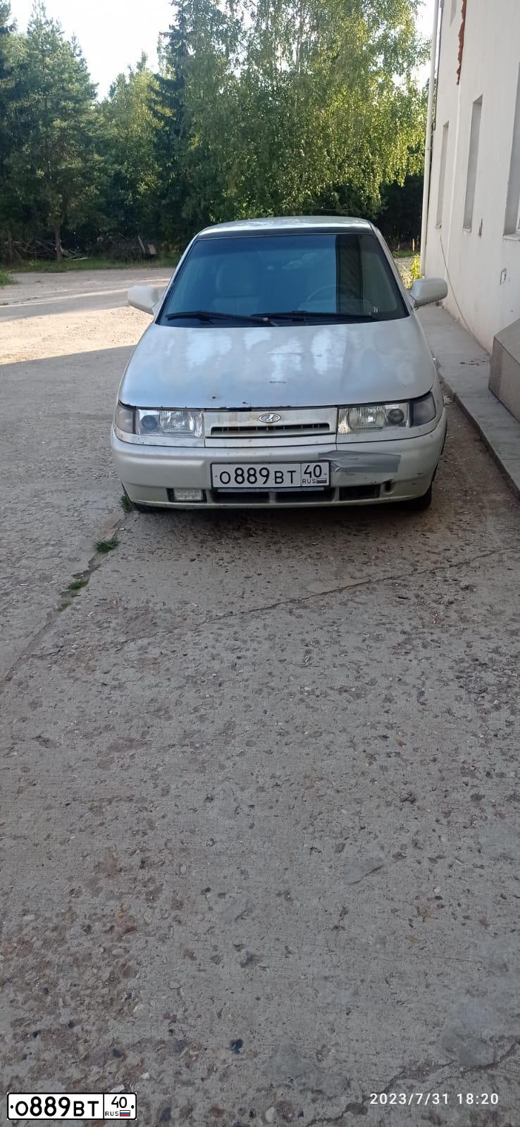 Фото автомобиля LADA 2112, 2003 — госномер В060ОН40. Цвет: МОЛОЧНО-БЕЛЫЙ СЕРЕБРИСТЫЙ