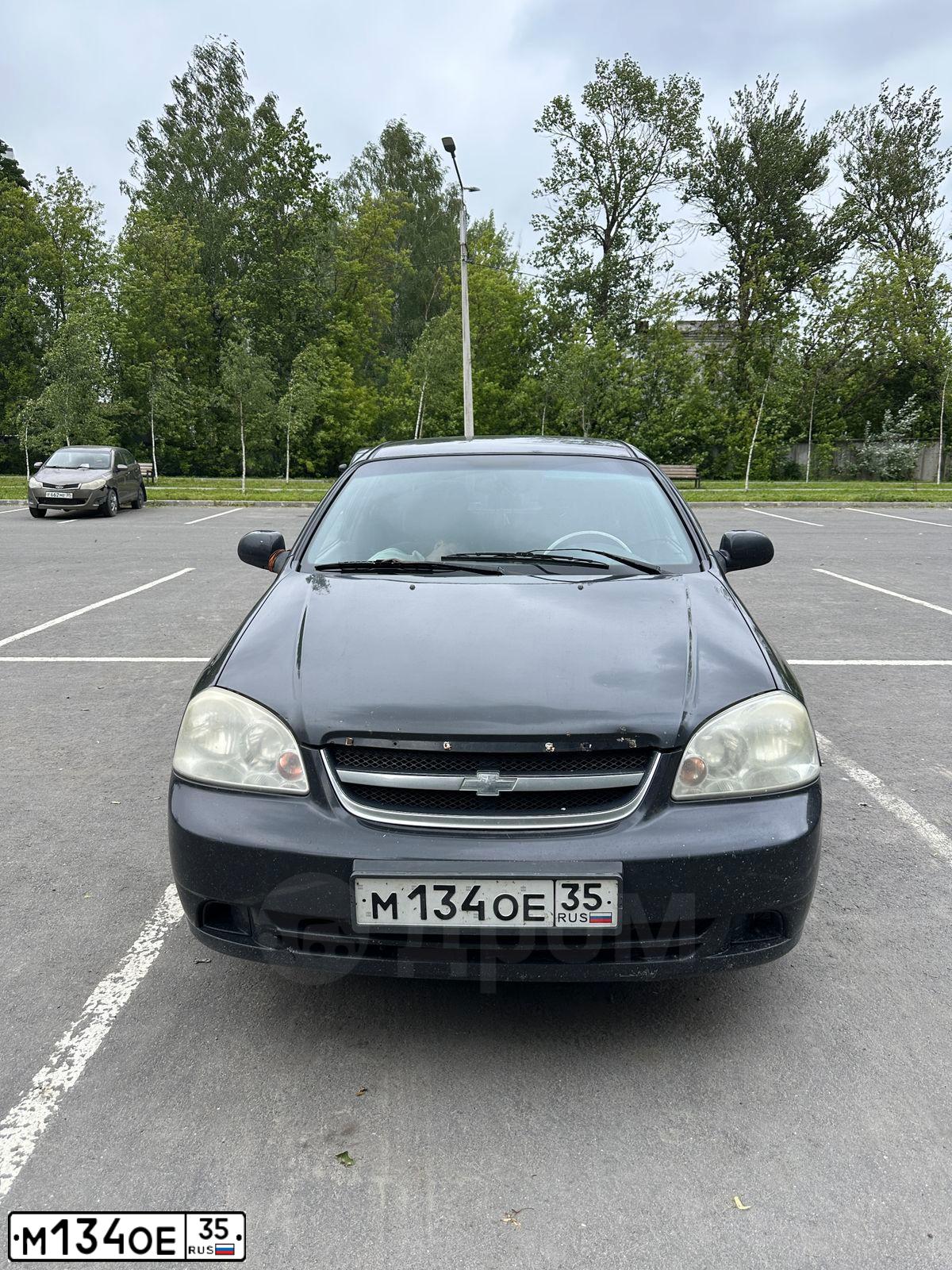Фото автомобиля CHEVROLET LACETTI, 2008 — госномер М134ОЕ35. Цвет: ЧЕРНЫЙ