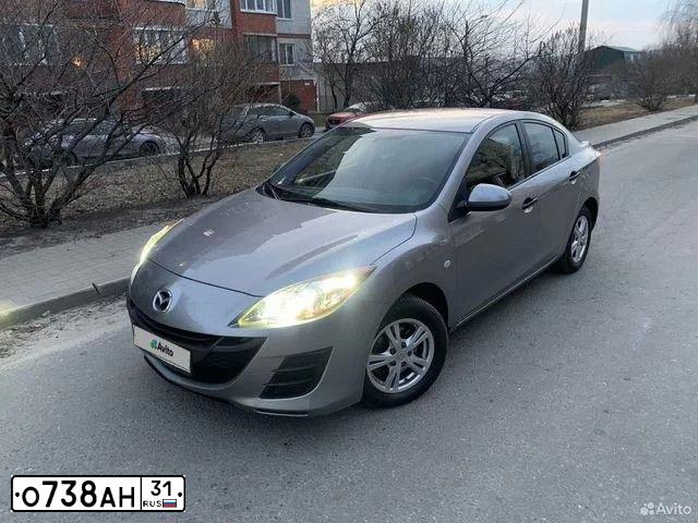 Фото автомобиля MAZDA 3, 2009 — госномер Х249ЕМ31. Цвет: Серебристый