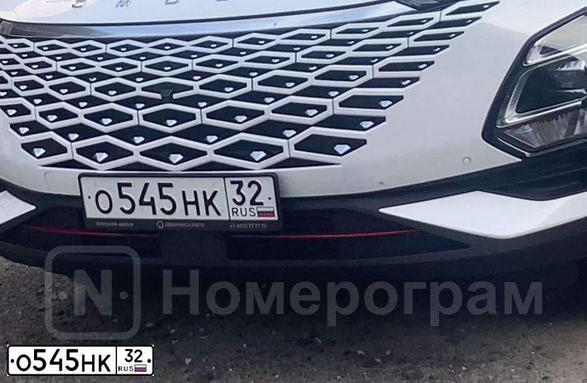 Фото автомобиля OMODA C5, 2023 — госномер О545НК32. Цвет: БЕЛЫЙ ЧЕРНЫЙ
