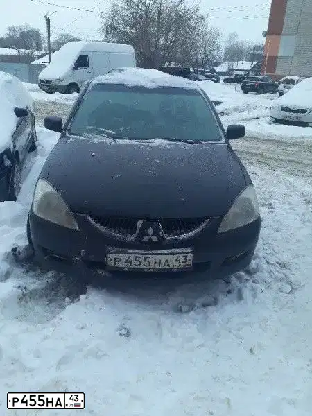 Фото автомобиля MITSUBISHI LANCER, 2005 — госномер Р923СТ11. Цвет: ЧЕРНЫЙ