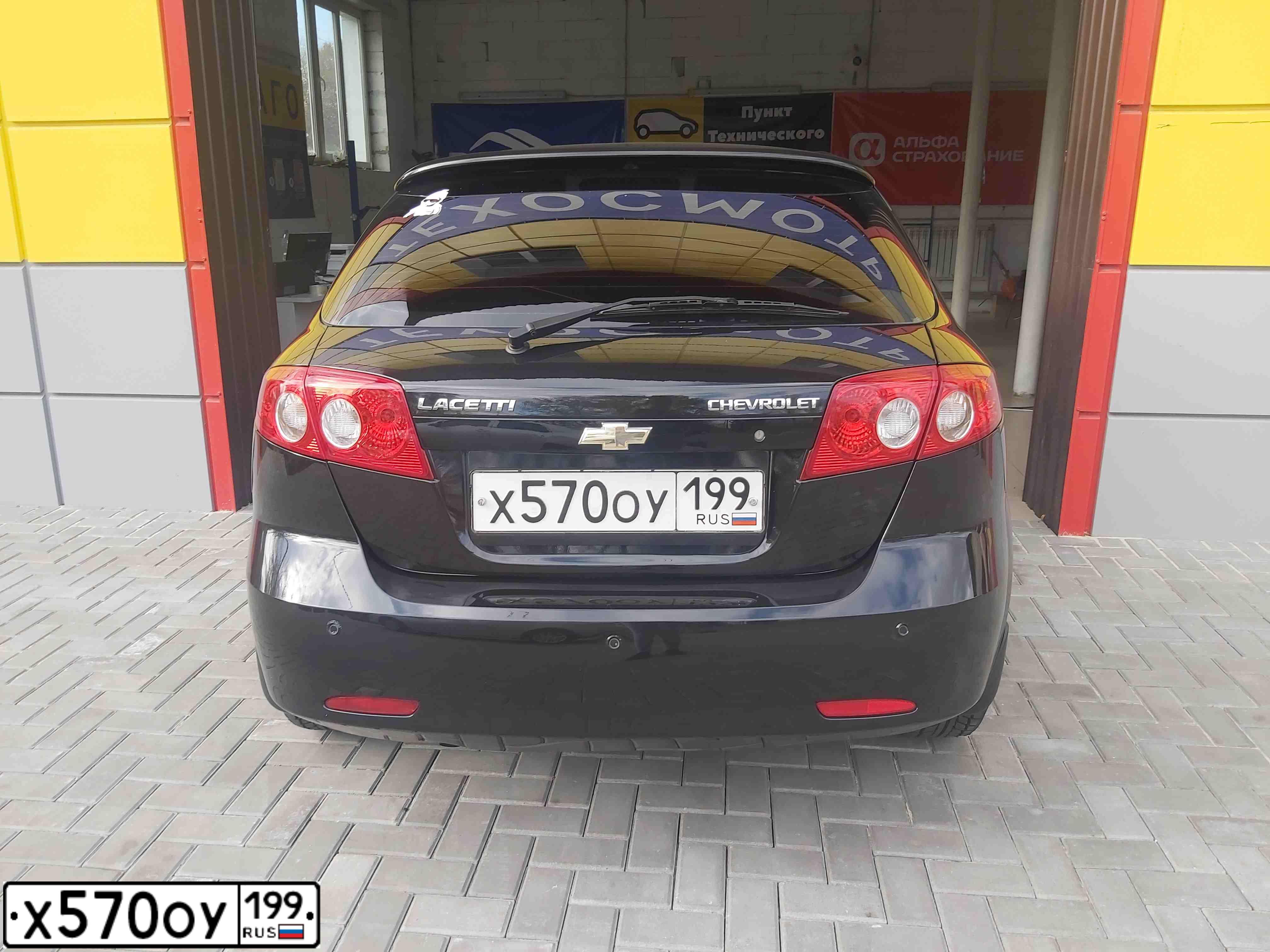 Фото автомобиля CHEVROLET LACETTI, 2008 — госномер Р240ТО46. Цвет: ЧЕРНЫЙ
