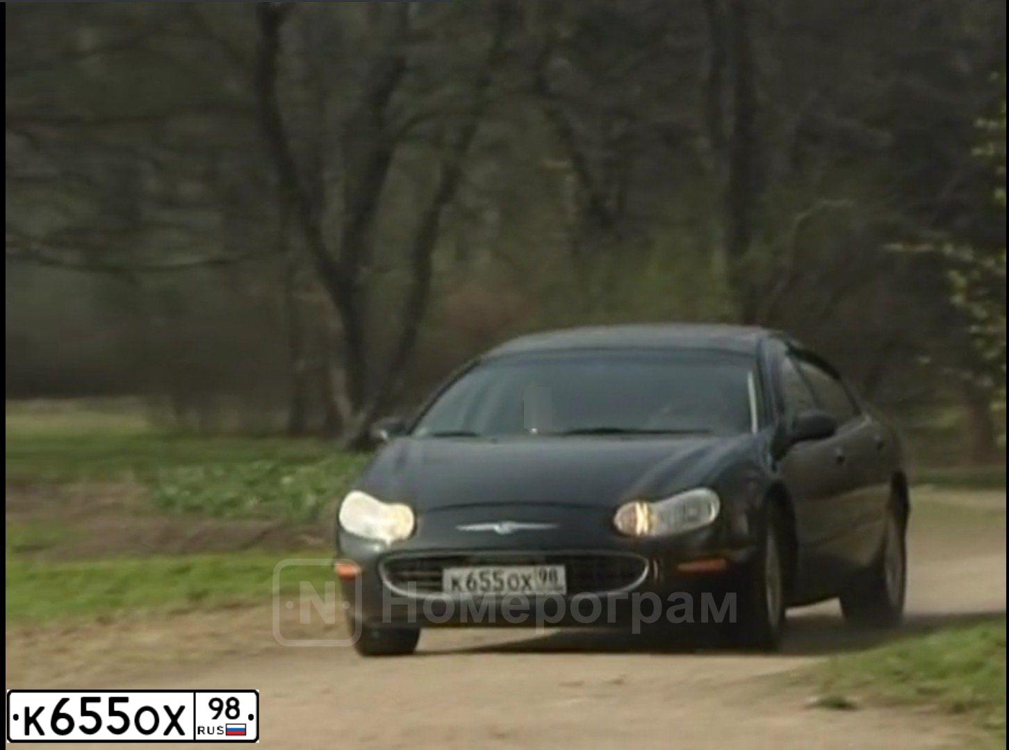 Фото автомобиля CHRYSLER CONCORDE, 1999 — госномер К655ОХ98. Цвет: ЧЕРНЫЙ