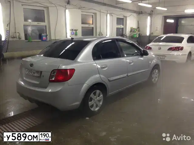 Фото автомобиля KIA RIO, 2010 — госномер О249АК134. Цвет: СЕРЫЙ