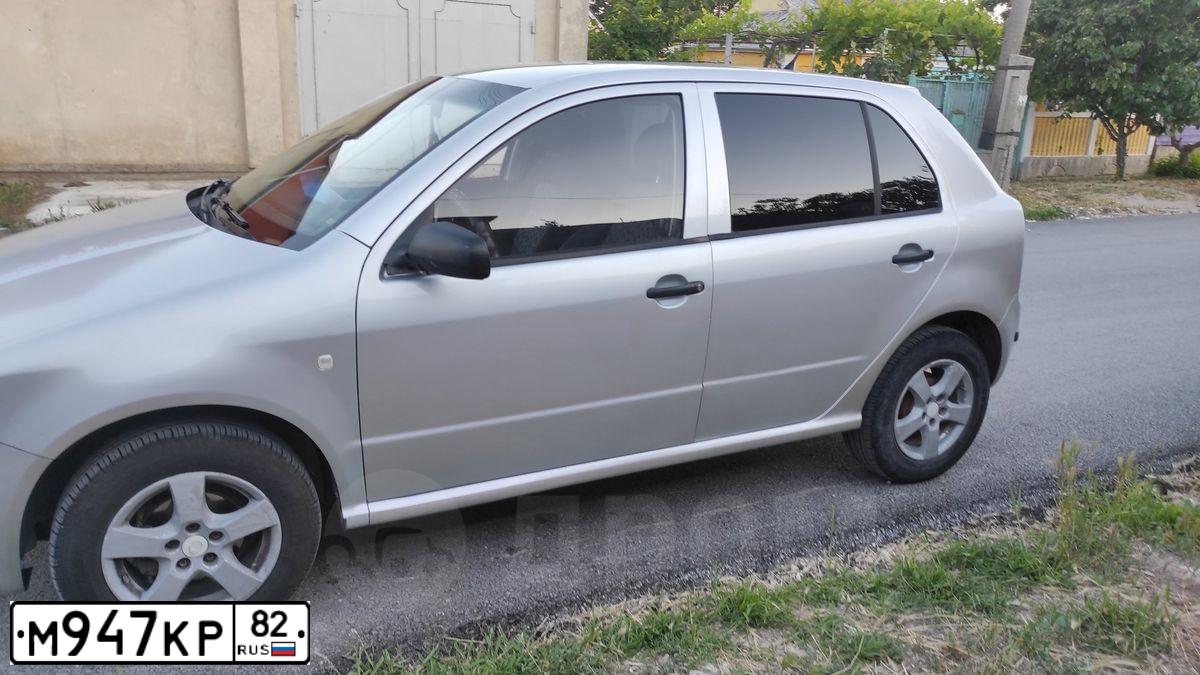 Фото автомобиля SKODA FABIA, 2007 — госномер М669РО82. Цвет: Серебристый