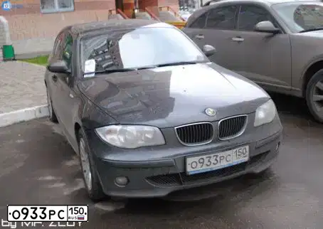 Фото автомобиля BMW SERIE 1, 2005 — госномер Е224СК01. Цвет: ЧЕРНЫЙ