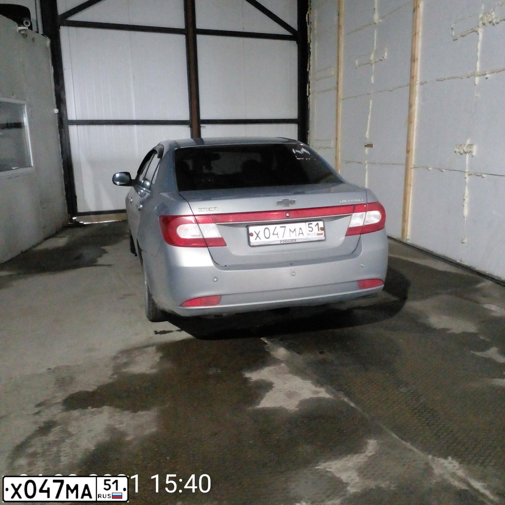 Фото автомобиля CHEVROLET EPICA, 2010 — госномер Х047МА51. Цвет: СЕРЫЙ